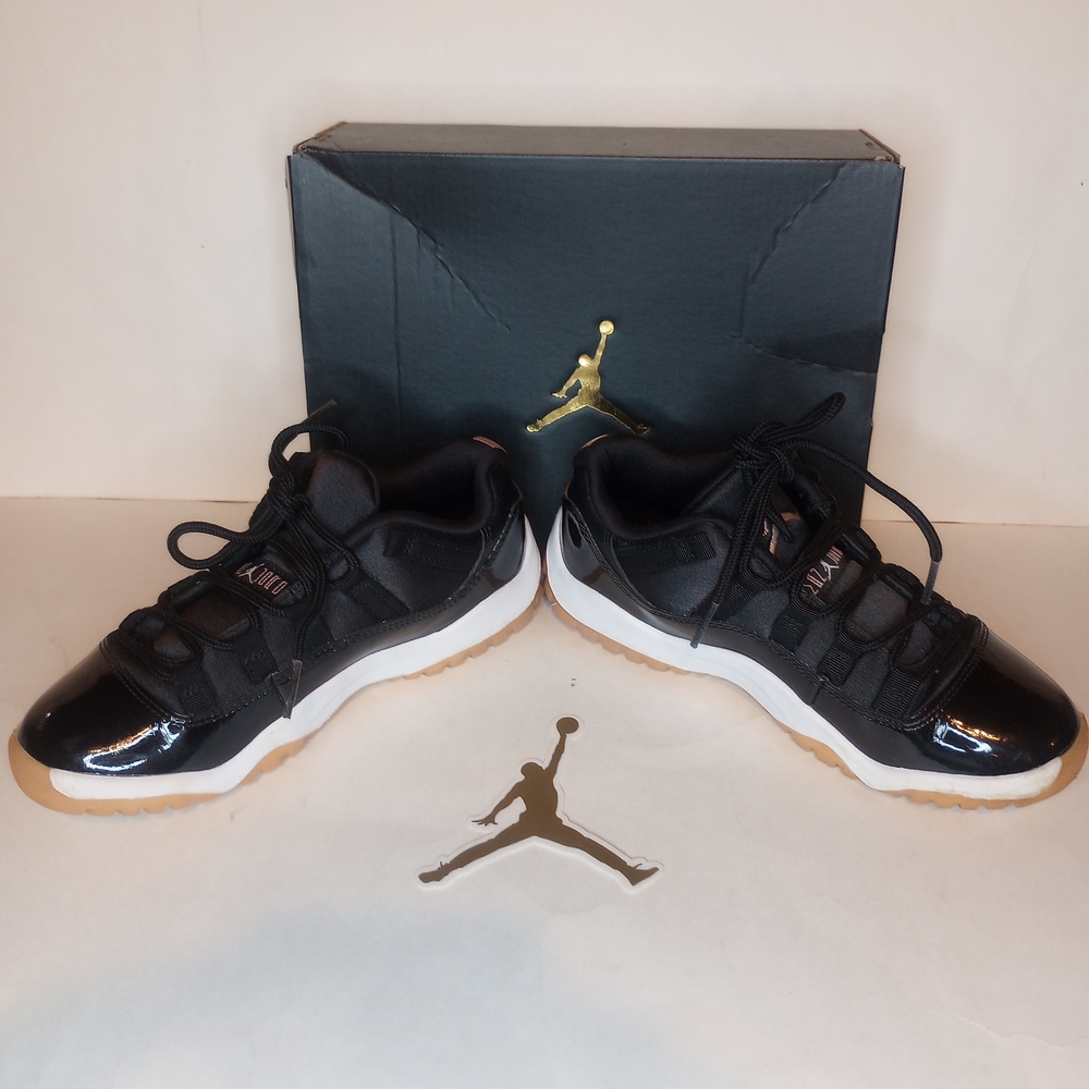 Jordan 11s Black and White Sneakers Bleached Coral Youth 1